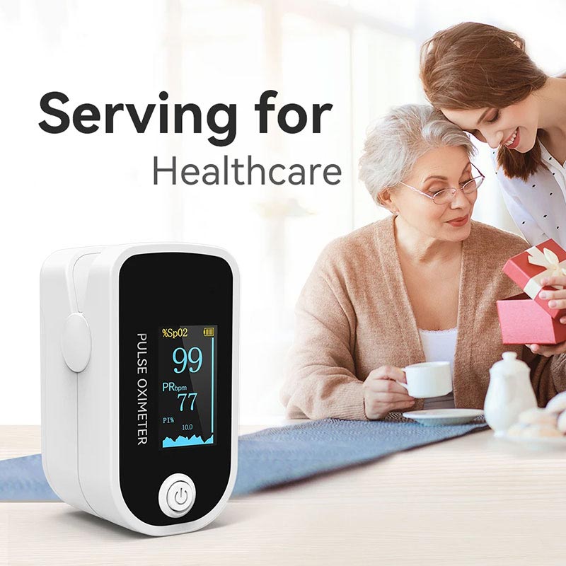 A young woman gifts a pulse oximeter to an elderly woman. They are seated at a table with a warm and friendly atmosphere, highlighted by the text "serving for healthcare" from MediWares