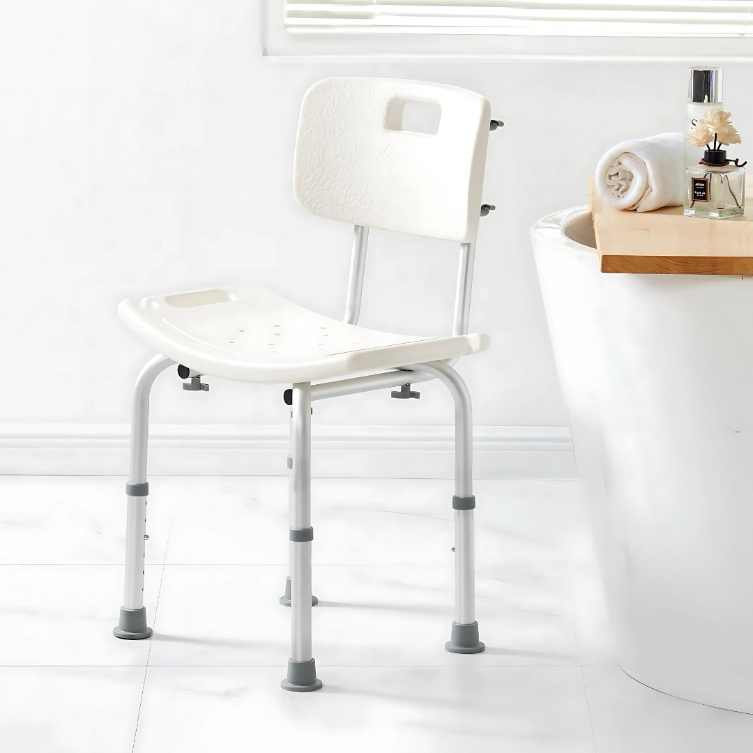 Shower chair placed next to a bathtub in a white bathroom setting