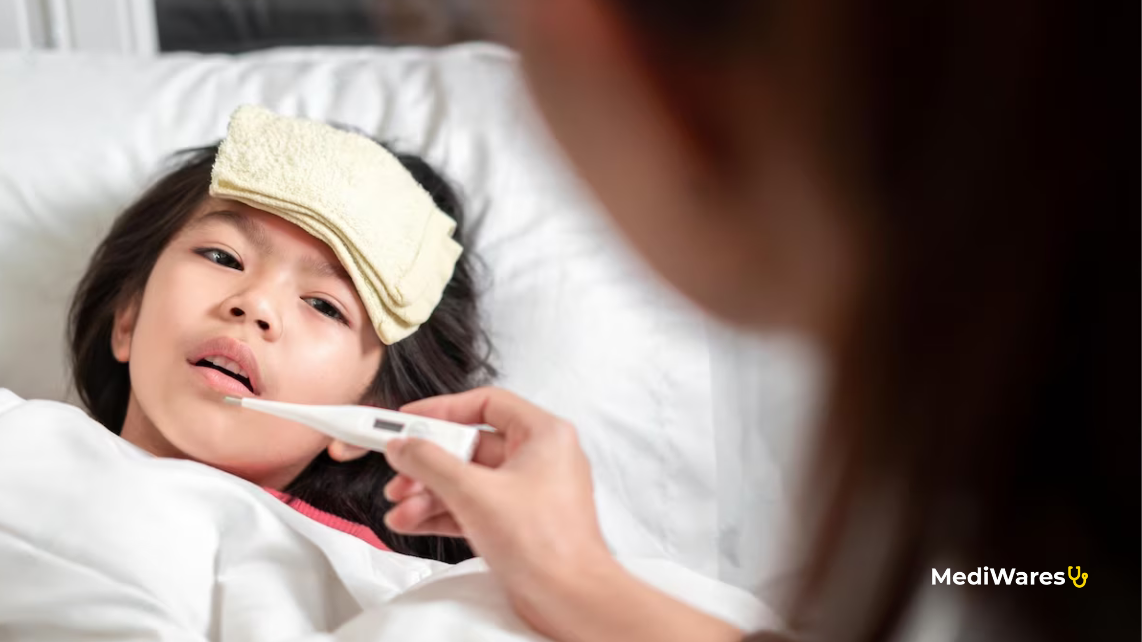 Parent checking child’s fever at night